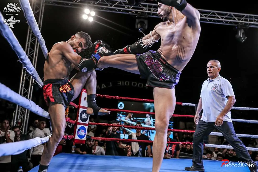 Hussein Ghaddar landing a high kick during a Muay Clubbing bout in Beirut