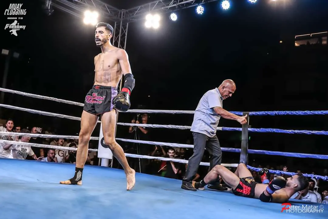 Hussein Ghaddar walking off after putting his opponent on the canvas