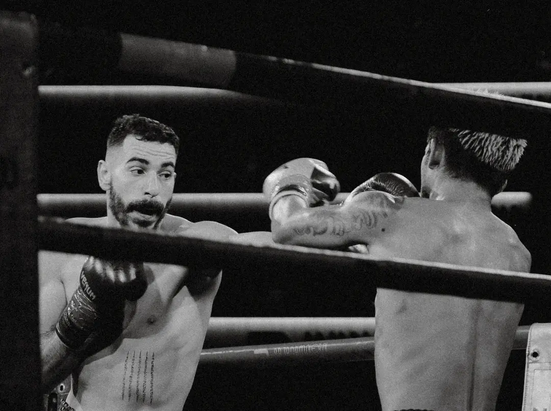 Hussein Ghaddar against the ropes during a Muay Thai bout at Rajadamnern Stadium in Bangkok